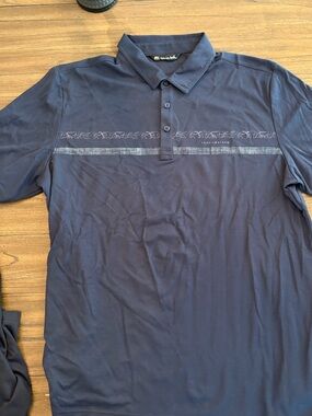 Travis Mathew Navy Polo with Subtle Chest Stripe